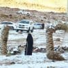 الثلوج تتساقط على قمم جبال اللوز بنيوم