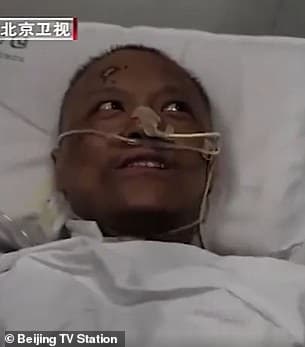 27426758-8237475-He_is_seen_after_being_revived_in_a_clip_released_by_Beijing_Sat-a-4_1587454614682