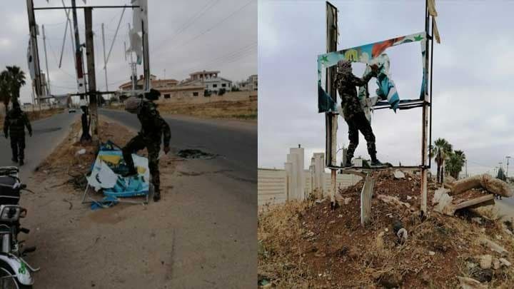 مسلحو “الفيلق الخامس” يمزقون صور لرأس النظام السوري في ريف درعا الشرقي