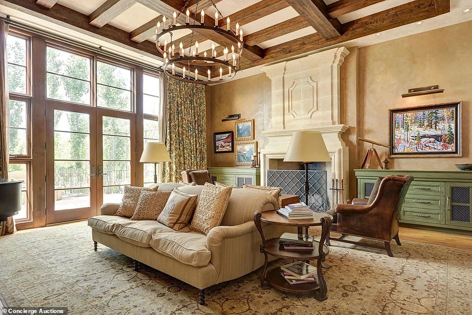 37455548-9102353-Listing_photos_show_that_the_mansion_also_boasts_multiple_fire_p-a-31_1609437963260