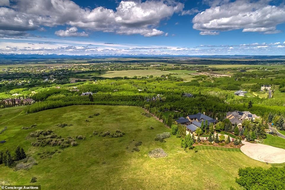 37455624-9102353-The_15_382_square_foot_home_is_set_on_two_acres_of_lush_green_la-a-23_1609437962899