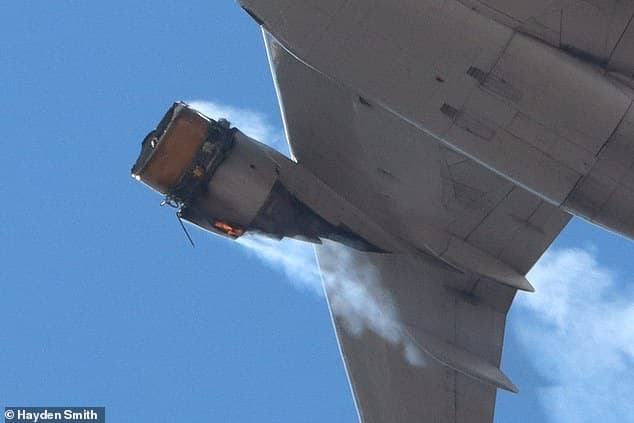39557508-9283741-Flames_could_be_seen_coming_from_the_engine_of_the_plane_after_i-a-11_1613918747287
