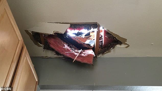 39565884-9283741-This_image_provided_by_KCNC_TV_in_Denver_shows_the_damage_done_w-a-18_1613918827689