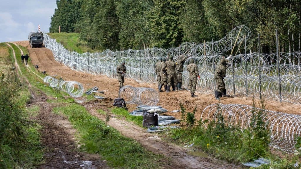 https___cdn.cnn.com_cnnnext_dam_assets_211013091530-restricted-poland-soldiers-belarus-border-fence-09-01-2021